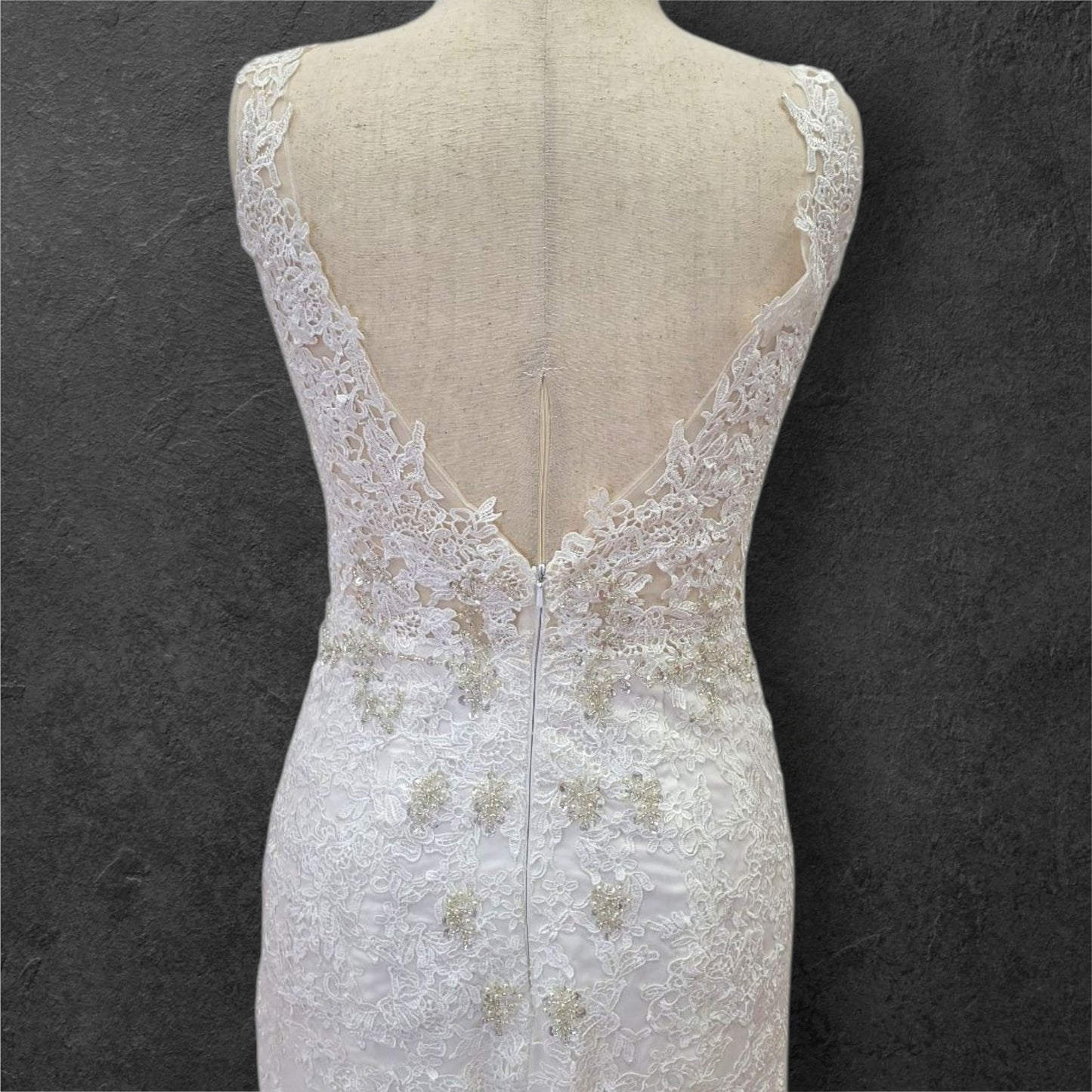 Elegant Fitted Wedding Dress with Low V-Back