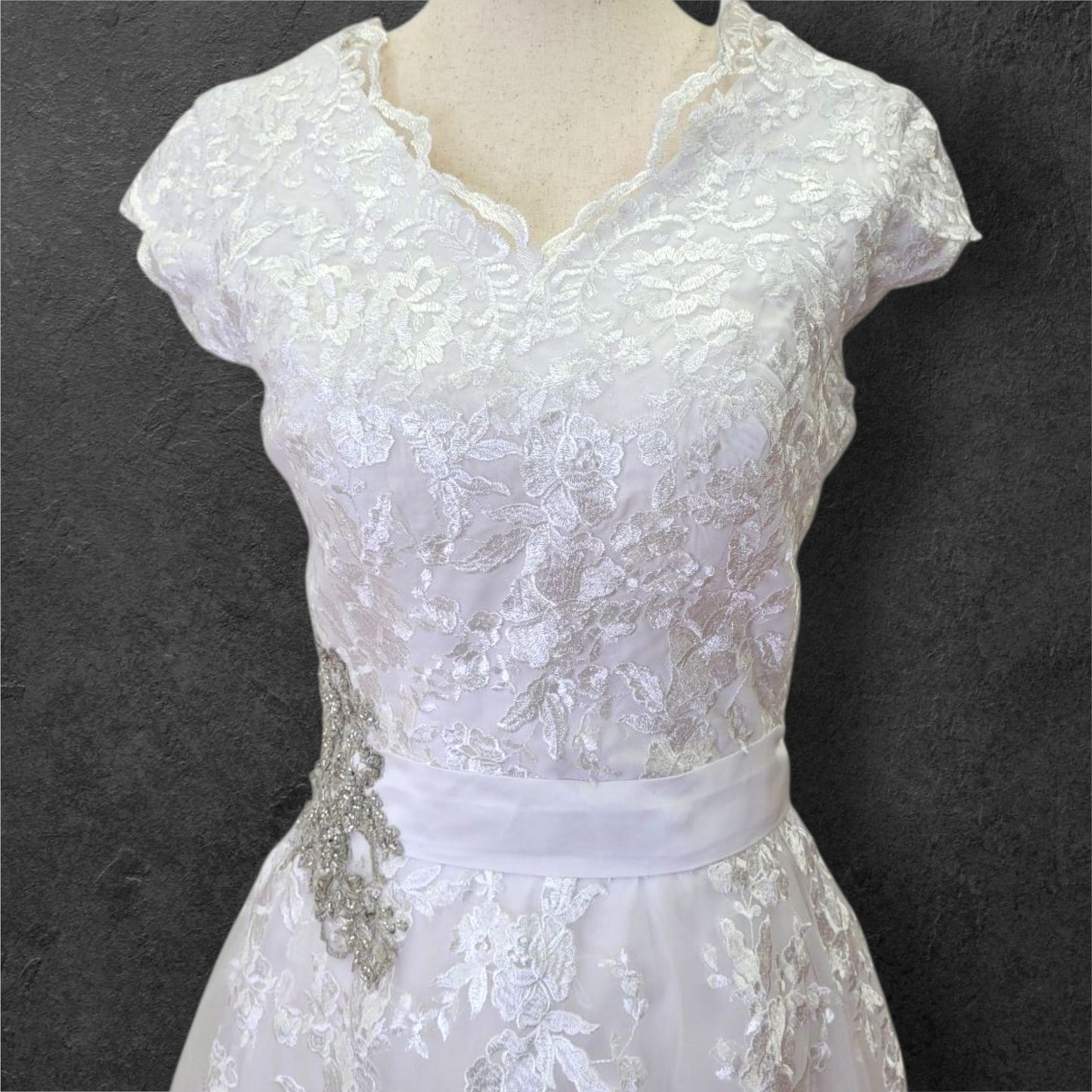 Cap Sleeve A Line Wedding Dress with Floral Appliques on Tulle Skirt with Silver Side Broach