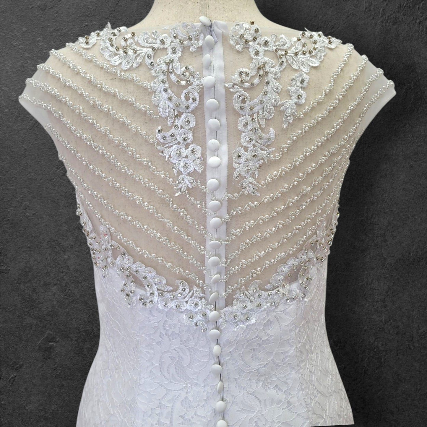 Intricately Beaded Wedding Dress with Plunge Neckline