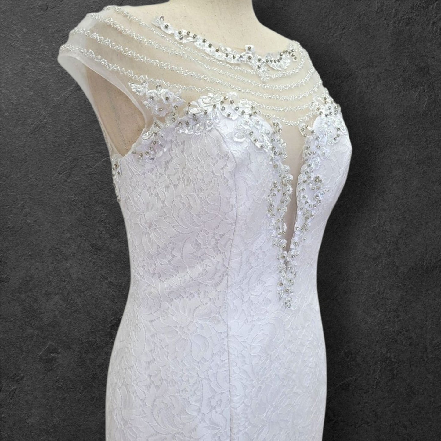 Intricately Beaded Wedding Dress with Plunge Neckline