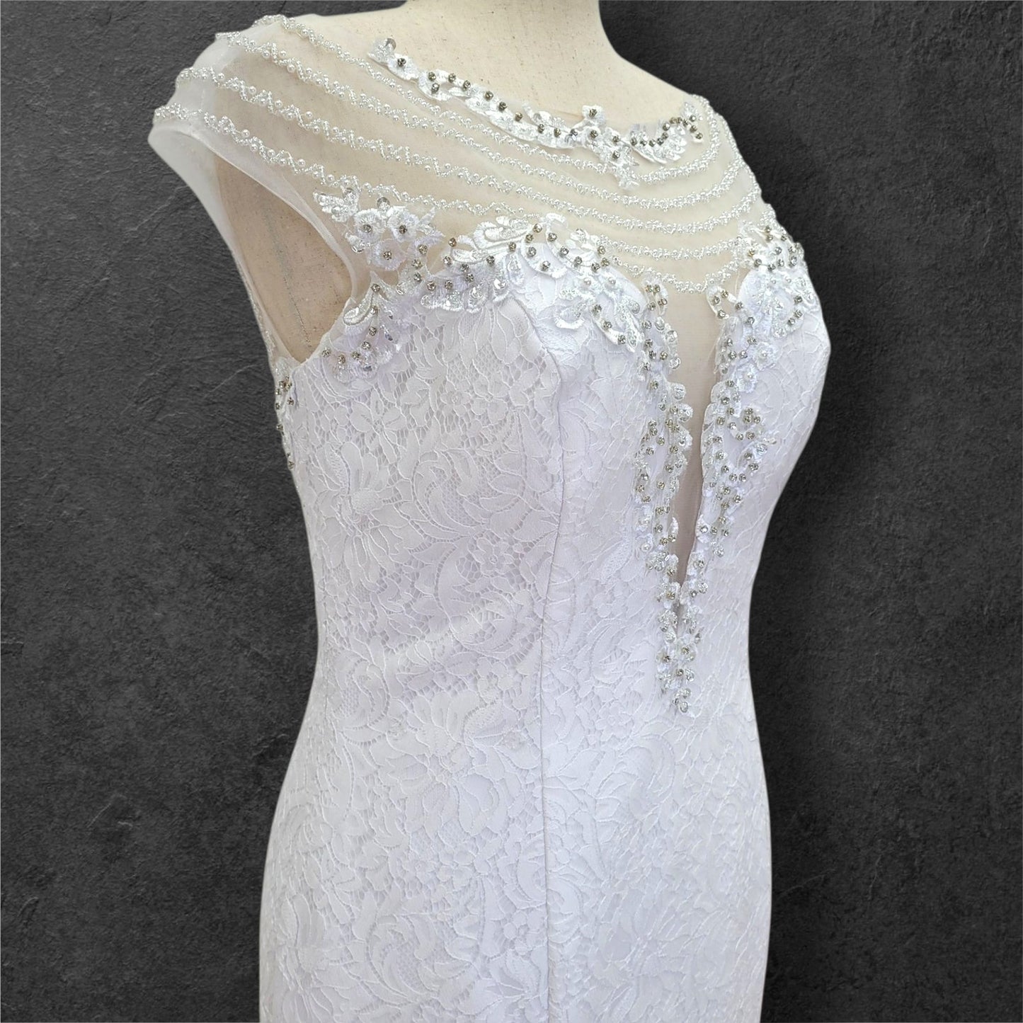 Intricately Beaded Wedding Dress with Plunge Neckline