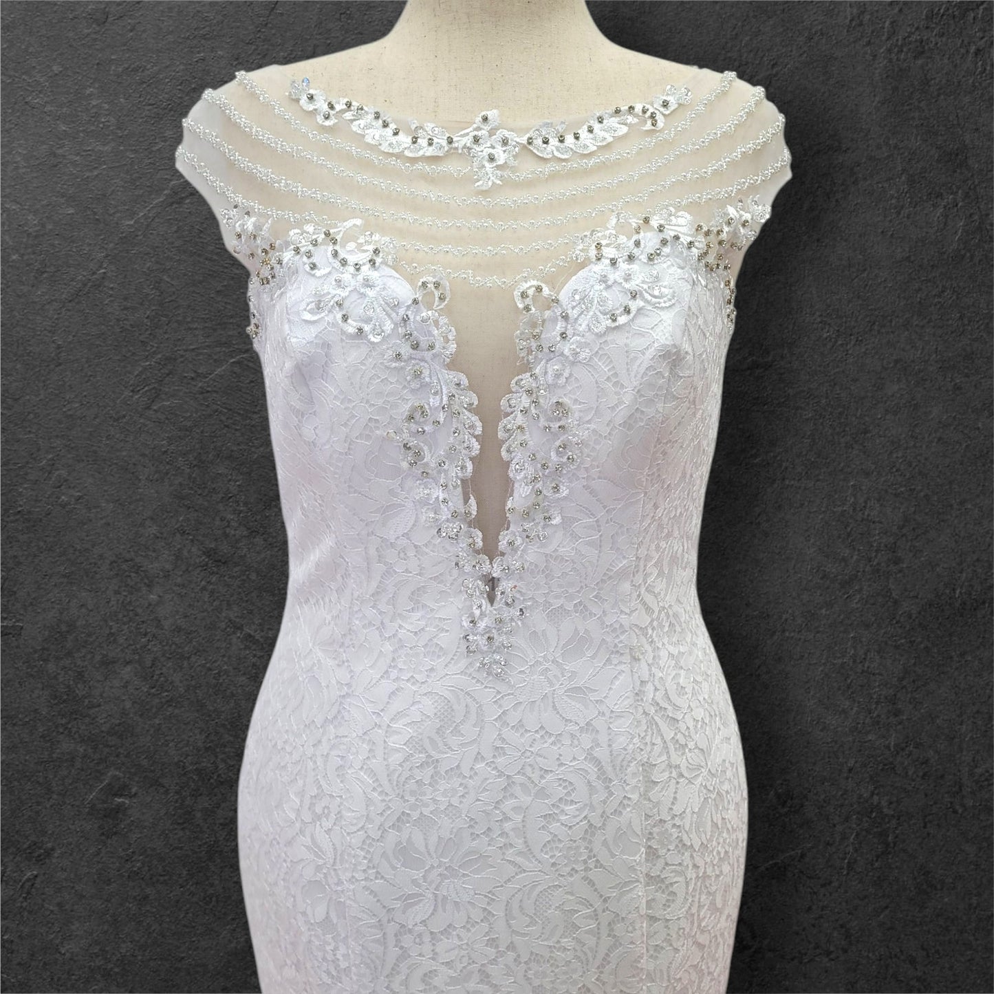 Intricately Beaded Wedding Dress with Plunge Neckline