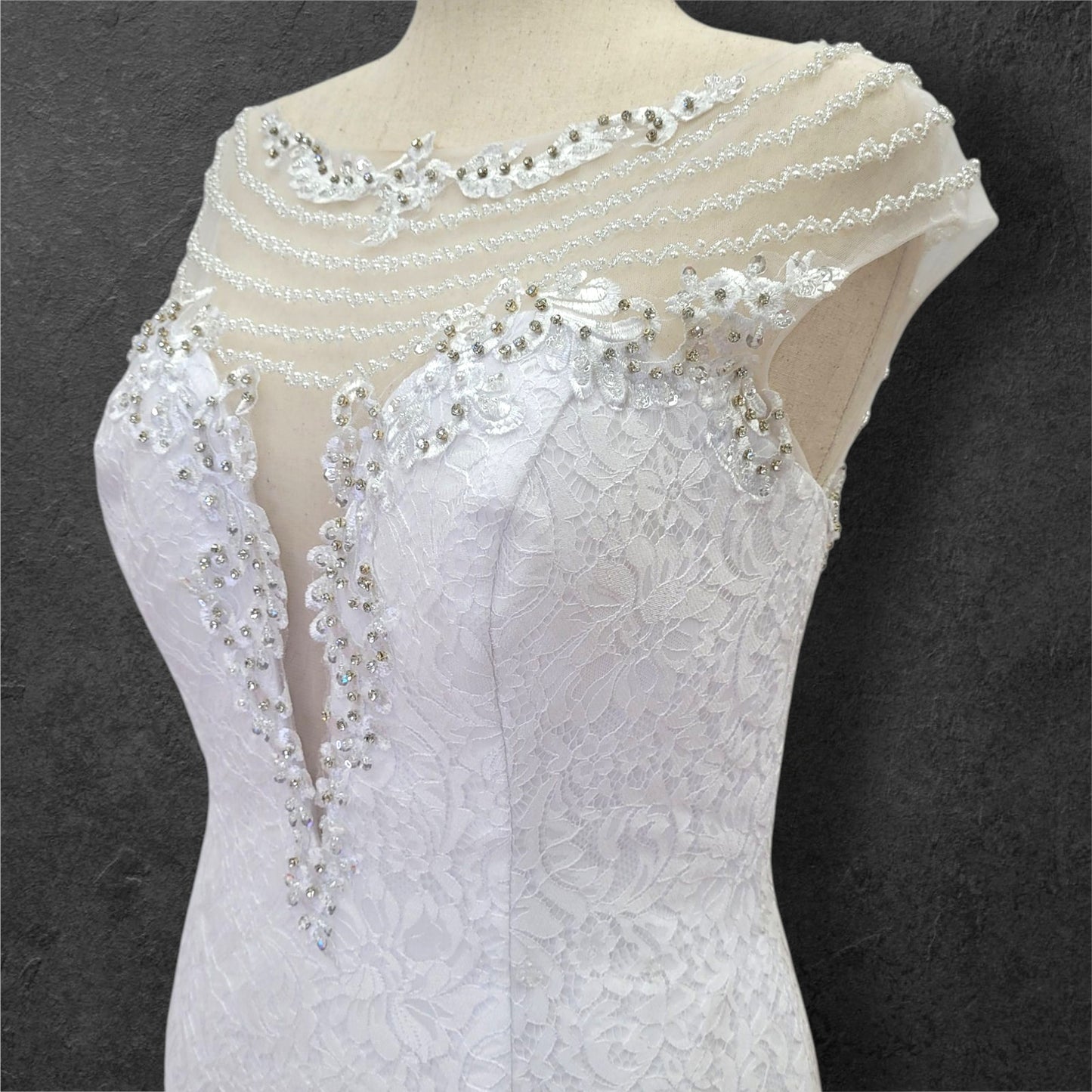 Intricately Beaded Wedding Dress with Plunge Neckline