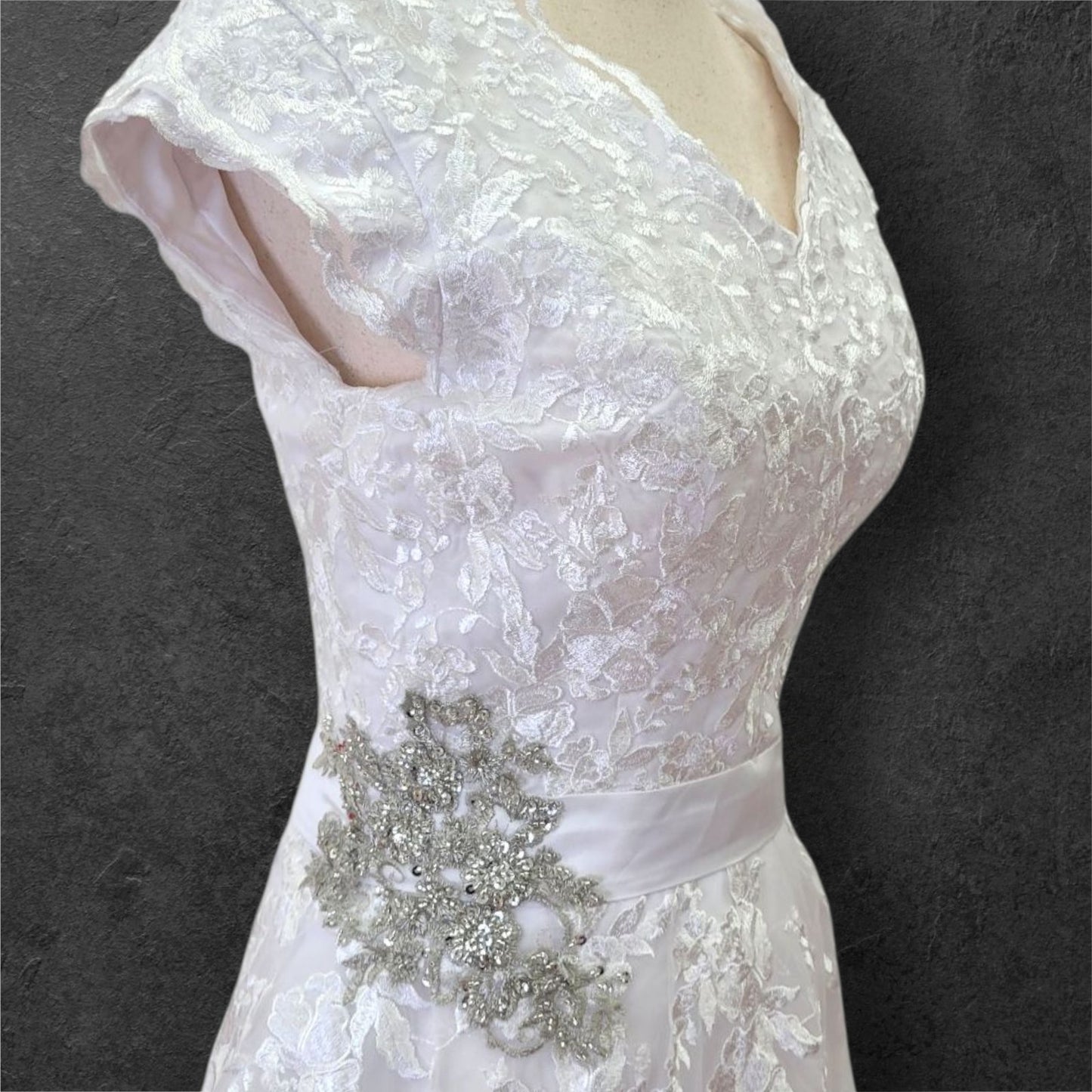 Cap Sleeve A Line Wedding Dress with Floral Appliques on Tulle Skirt with Silver Side Broach