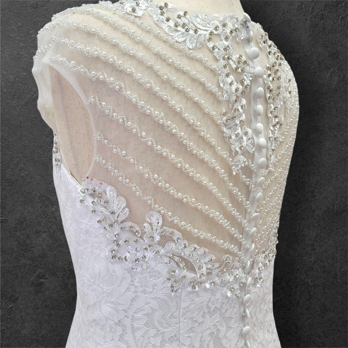 Intricately Beaded Wedding Dress with Plunge Neckline