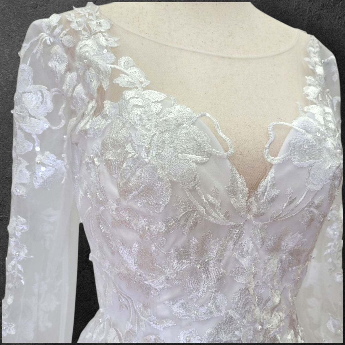 A Line Wedding Gown with Fitted Mesh Long Sleeves and Train with Floral Appliques